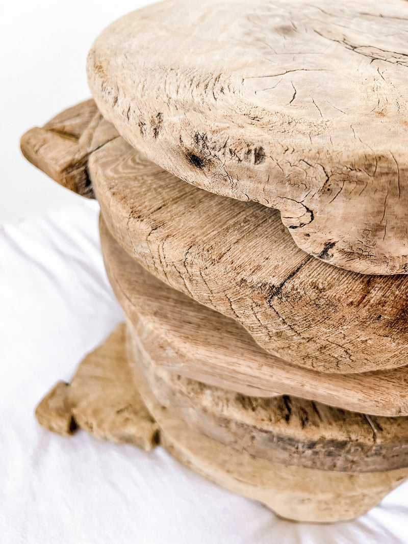 These authentic vintage bleached Indian chakla plates are unique antique pieces, each around 50 years old. They have a beautiful raw earthy aesthetic and make a stunning piece displayed as is, or topped with your favourite candle or décor piece. Place on a coffee/side table, shelf or console. 