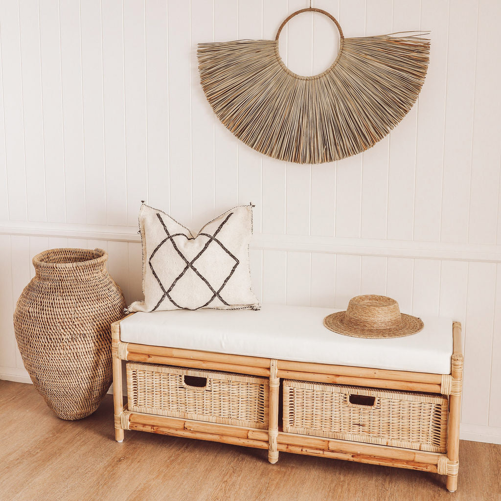 seagrass wall hanging A handwoven jute hoop with a skirt of natural alang alang seagrass. Created with raw textures & natural elements, this clean cut wall hanging is ideal for those that prefer a symmetrical structured style.