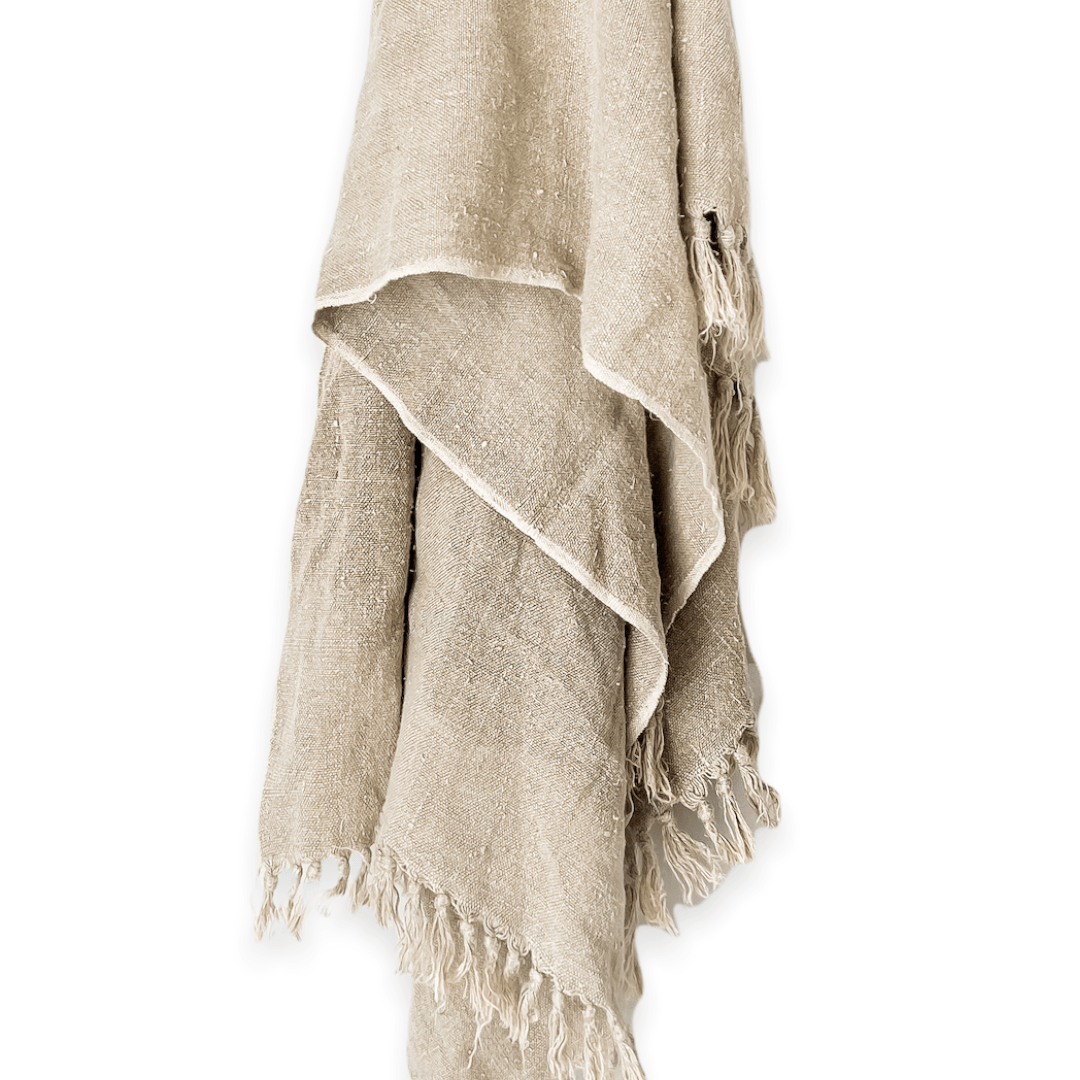 A weighted, hand loomed subtle textured throw made in India from 100% pure linen. Soft, versatile, thick & visually rustic with a farmhouse meets luxe aesthetic, this beautiful piece will make a quality statement in your home for years to come. 