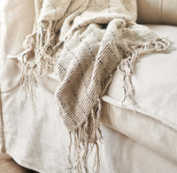 The Mayla Linen/Cotton throwrug by Eadie Lifestyle oozes comfort and warmth with its divine tactility. A welcome addition to our much loved Hand Woven collection, the rustic texture is carefully crafted by artisans who weave the fabric on a traditional hand loom with love and care.   Generous in size & visually rustic, this piece is ideal for layering on a bed or sofa. Its weight and softness showcases a rich & luxurious quality. Pairs well with stonewashed linens, crisp whites & matching Mayla Cushions. 