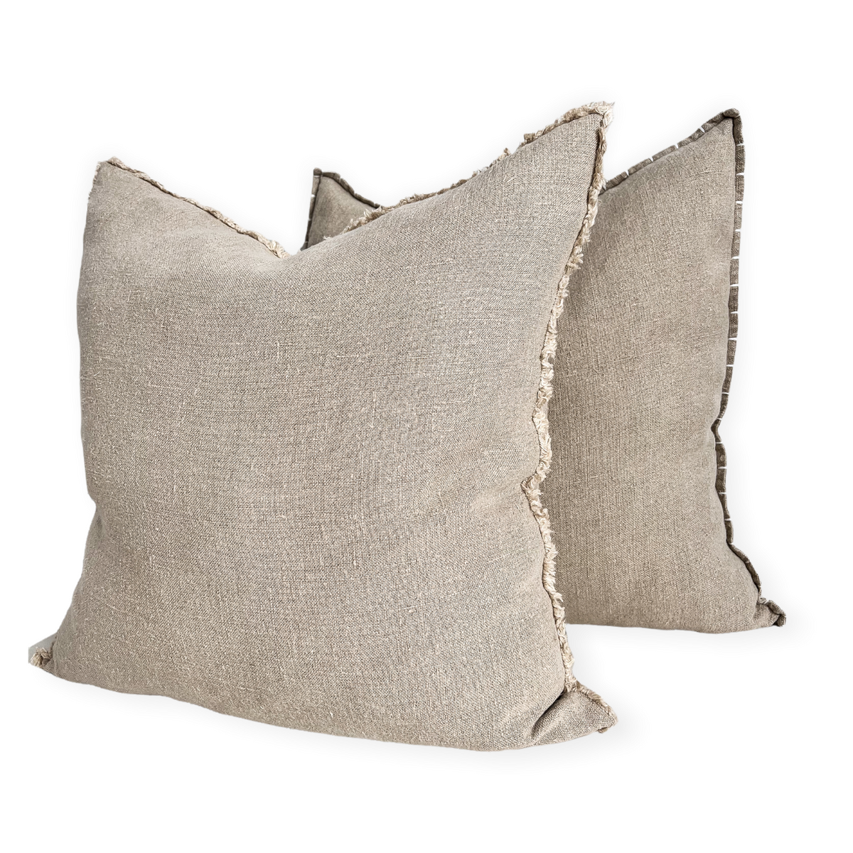 Natural heavy linen, 350gsm cushion covers available in a raw fringe edge or embroidered. Pure quality linen in natural earthy colours with a rustic stonewash finish. 50cm throwrug also available 
